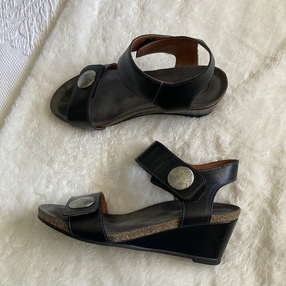 Taos Footwear Black Leather Wedge Sandals with Decorative Silver Discs